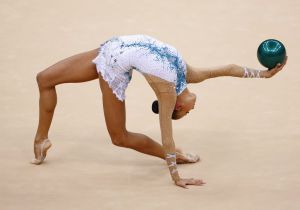 Russia's Daria Dmitrieva competes using the ball in her individual all-around gymnastics qualification match at the Wembley Arena during the London 2012 Olympic Games